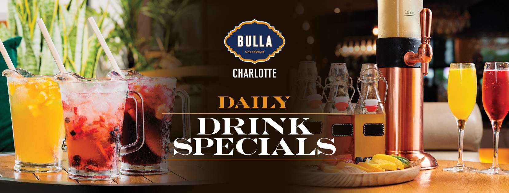 Colorful sangría pitchers, mimosas, and cocktail towers set on a wooden table at Bulla Gastrobar Charlotte promoting their Daily Drink Specials.