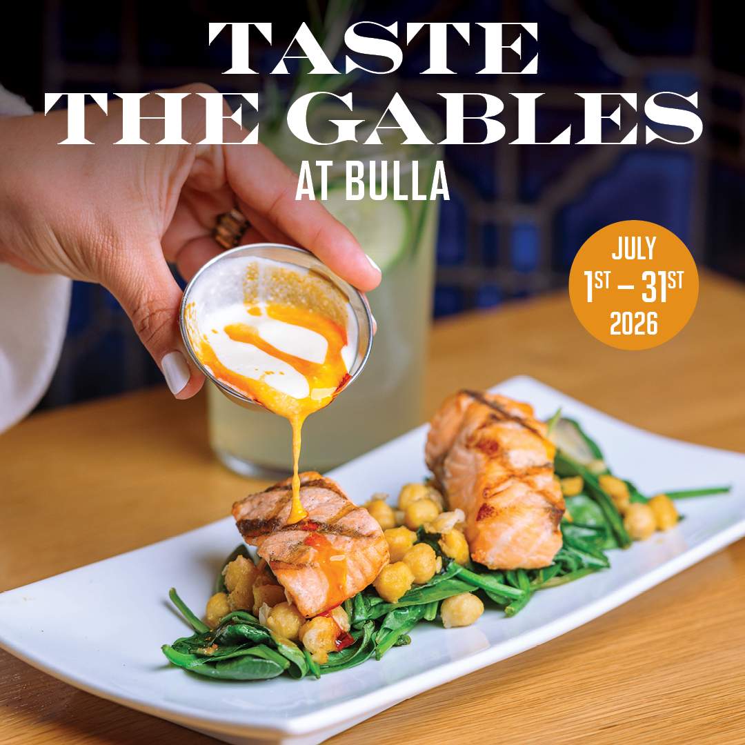 Grilled salmon dish with greens and chickpeas at Bulla Gastrobar, promoting Taste the Gables at Bulla from July 1st to July 31st, 2026.