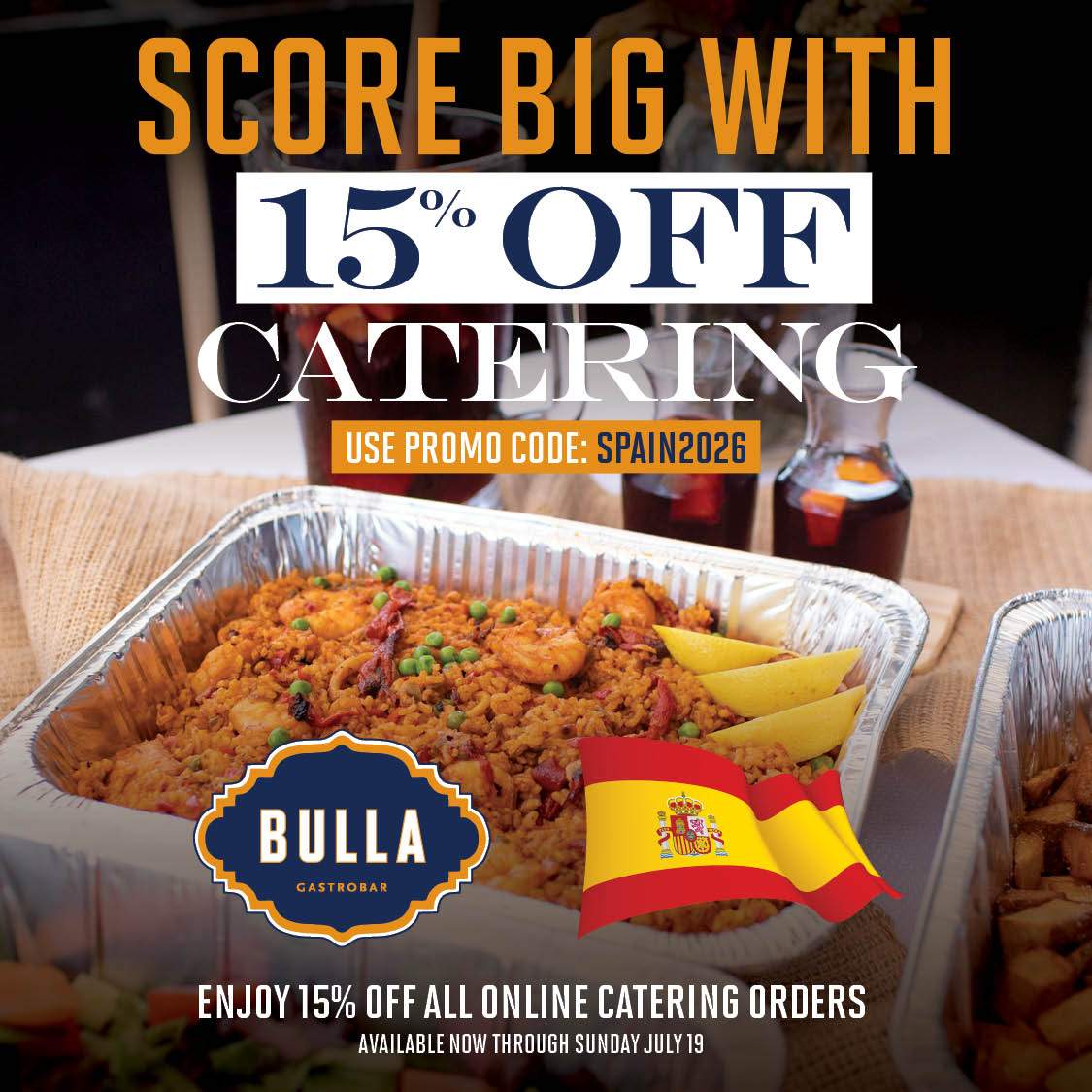Bulla Gastrobar catering promotion featuring a tray of Spanish paella, sangria, and a Spanish flag with the text “Score Big with 15% Off Catering.” The graphic includes promo code SPAIN2026 and notes that guests receive 15% off online catering orders through Sunday, July 19.