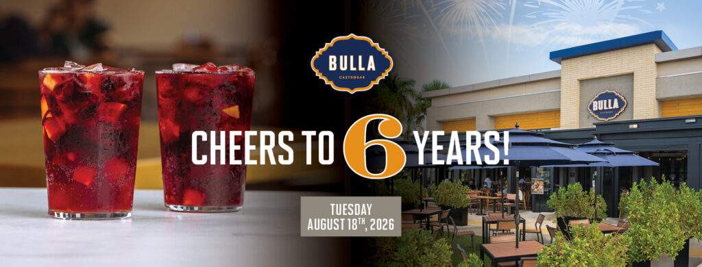 Bulla Gastrobar The Falls 6th anniversary promotion featuring the restaurant exterior with patio seating and fireworks graphics. Event takes place Tuesday, August 18th, 2026, with paella samples, extended cocktail happy hour, sangría specials, raffle, and more.