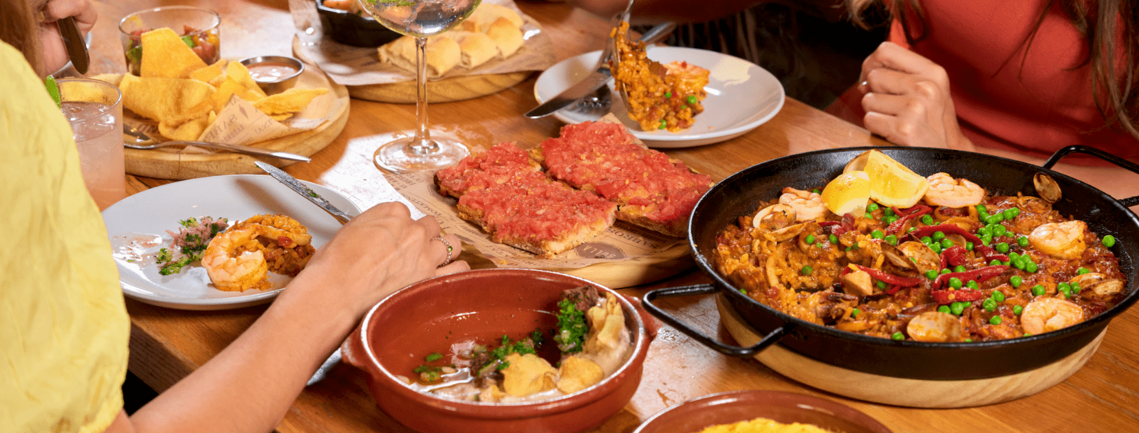 Selection of Bulla Gastrobar Spanish tapas served on a table, featuring shareable small plates with bold flavors and fresh ingredients.