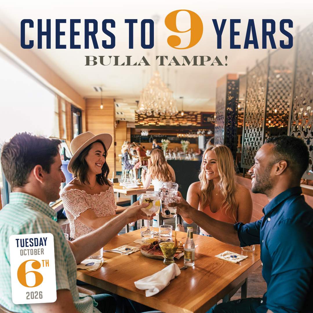 Bulla Tampa 9th anniversary celebration with friends raising glasses at the restaurant on October 6, 2026.